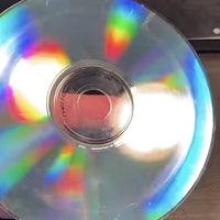 a cd is sitting on top of a table